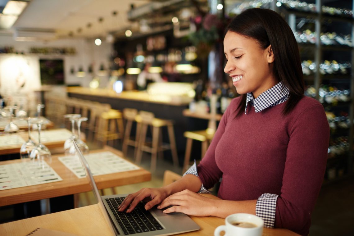 latino founder on laptop