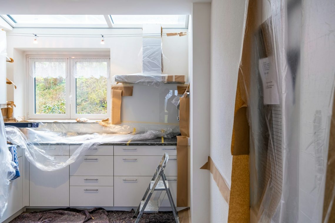 white wooden cabinet near window during Real Estate Development