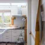 white wooden cabinet near window during Real Estate Development