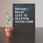 difficult roads lead to beautiful destinations desk decor; uncertain without losing momentum