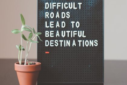 difficult roads lead to beautiful destinations desk decor; uncertain without losing momentum
