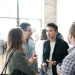 people gathering in room; promotional items networking events
